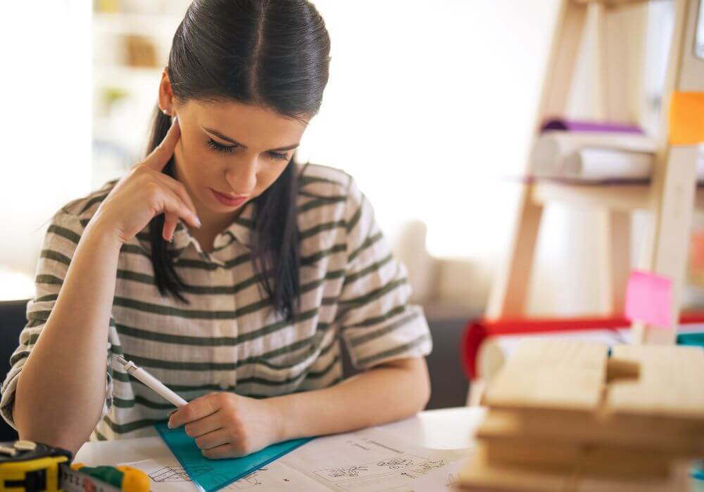 Woman working on her Life Planner Worksheets